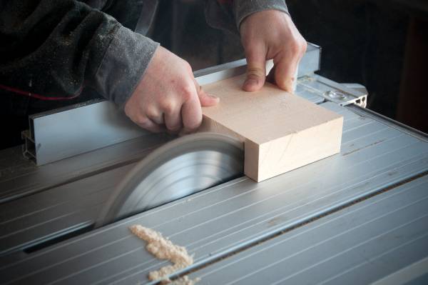 Gray table saw—how to square lumber with a table saw